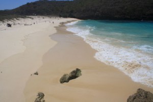 Enjoy the white sand and blue water at Tanjung Bloam